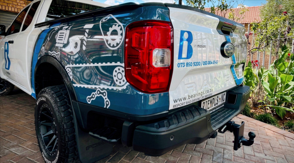 20205 model Ford Ranger with vehicle branding on it to display the details of the company