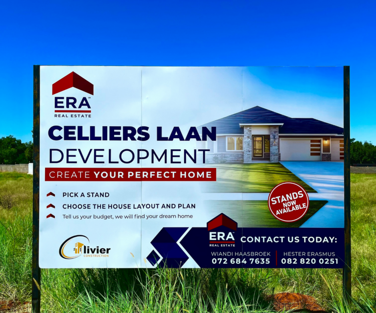 Era Property Agents signage board in a field next to the road displaying the company details