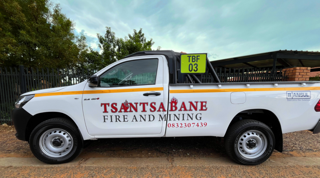 Toyota Hilux with reflective mine identification stickers on it to comply with mining regulations