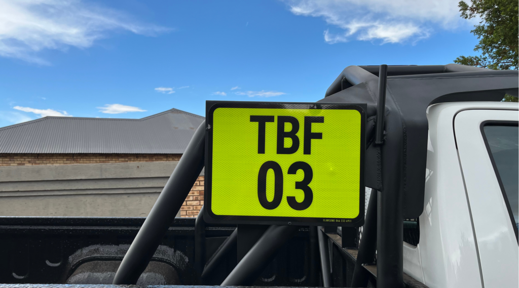 Toyota Hilux with reflective mine identification stickers on it to comply with mining regulations