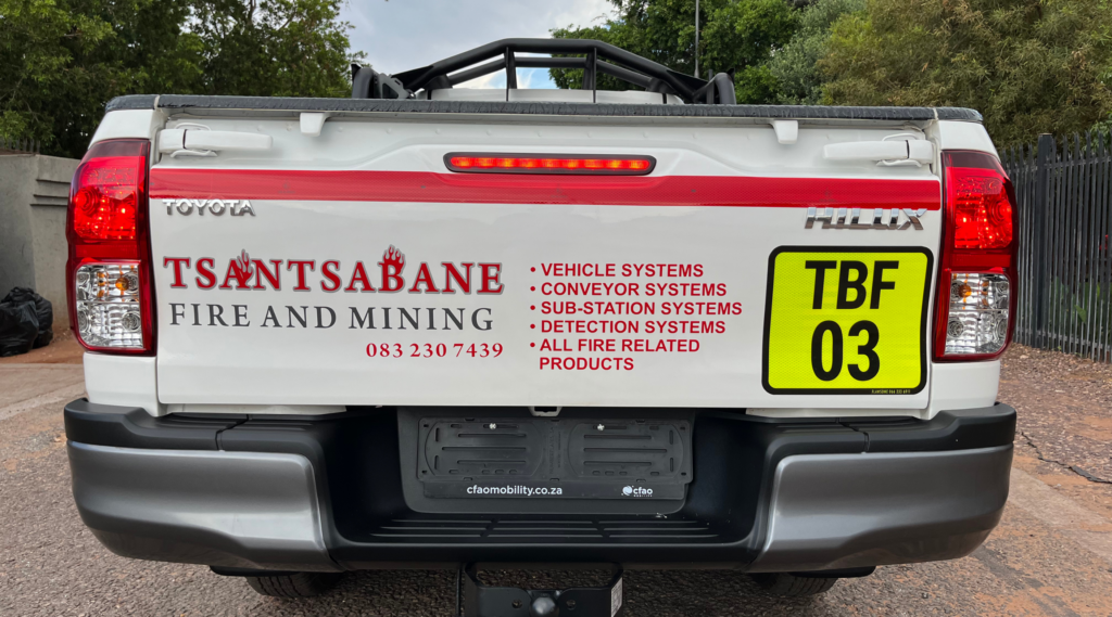 Toyota Hilux with reflective mine identification stickers on it to comply with mining regulations